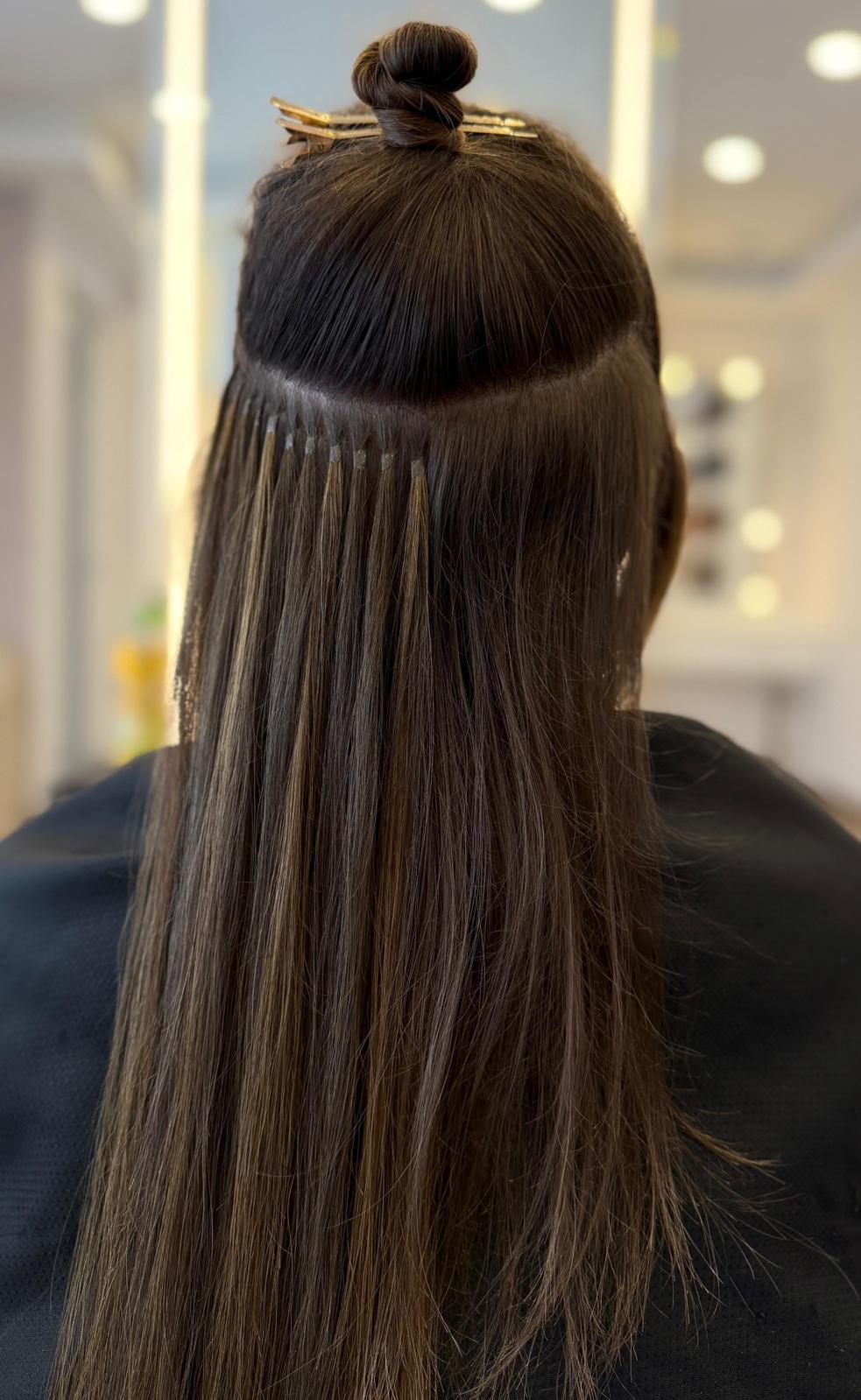 Extensions-Ansatz im Salonlicht